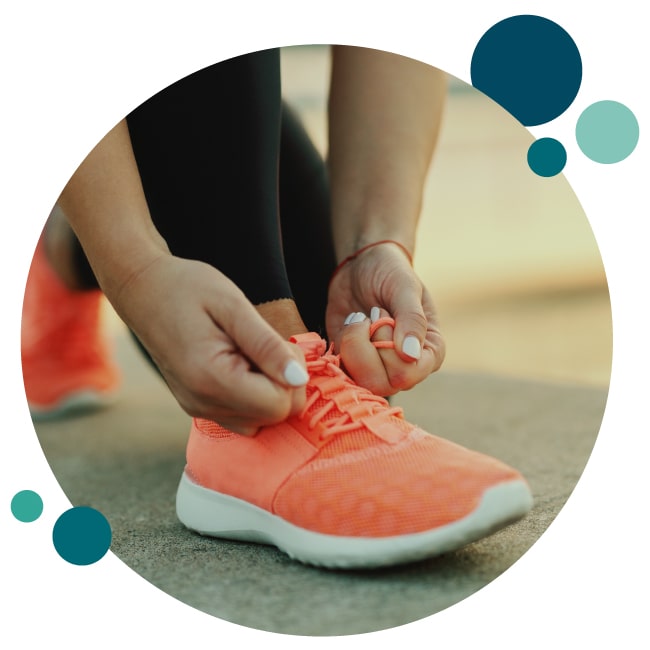 lacing up sneakers